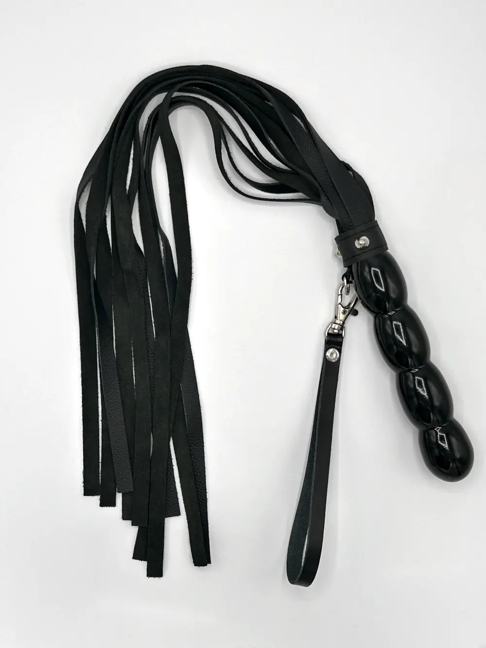 Streichelpeitsche aus Leder in schwarz von oben